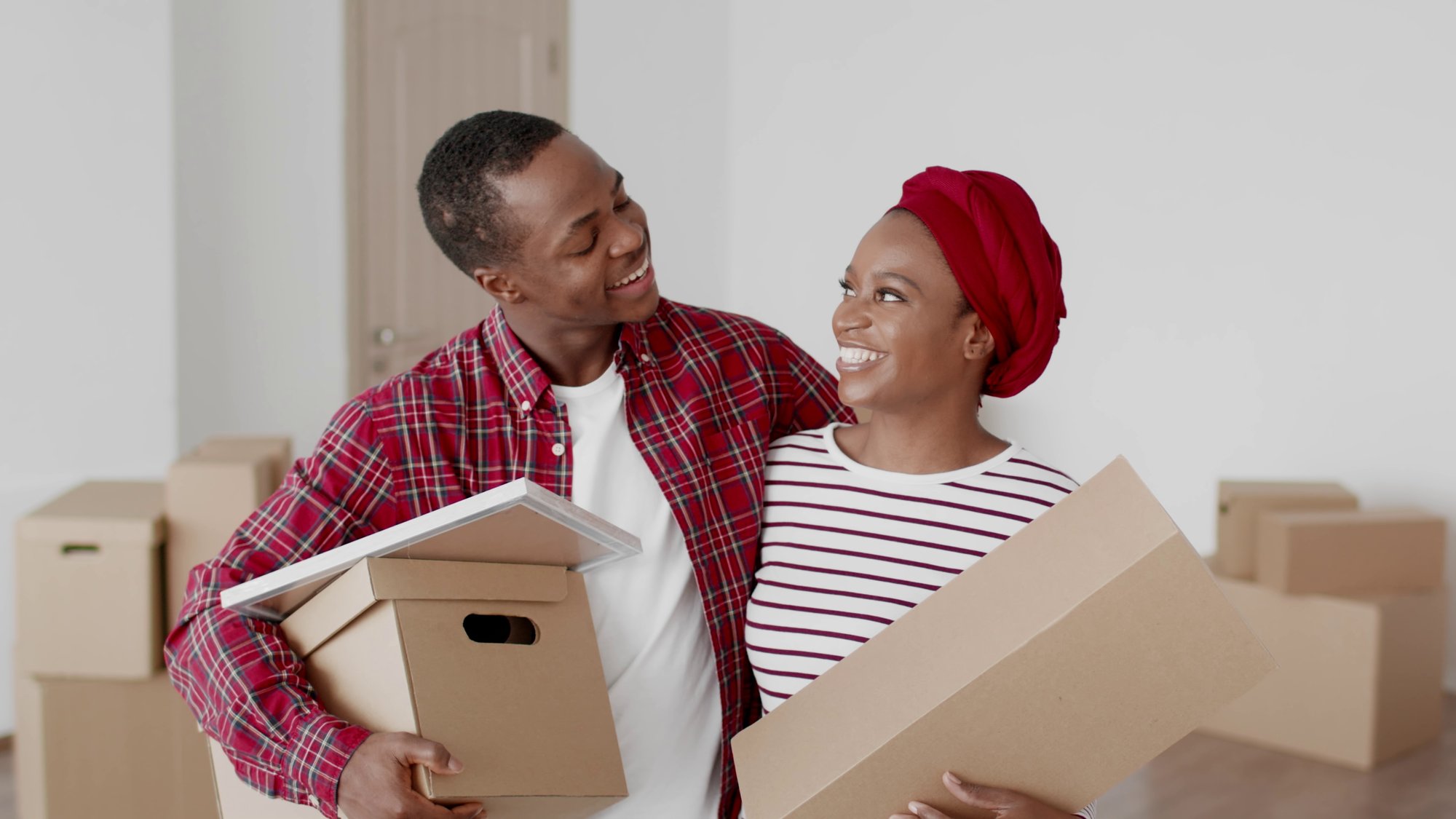happy couple moving boxes happy couple moving boxes
